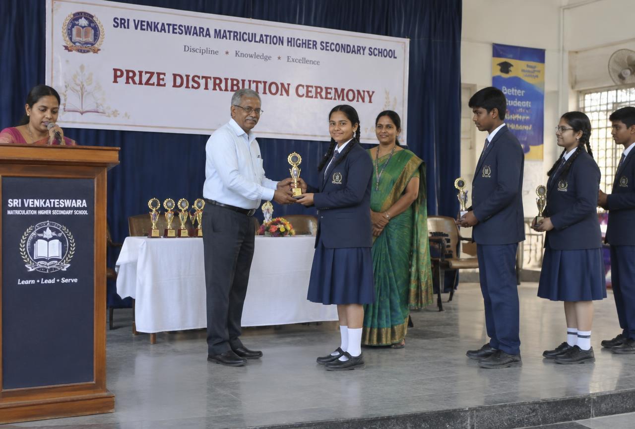 Student receiving a trophy